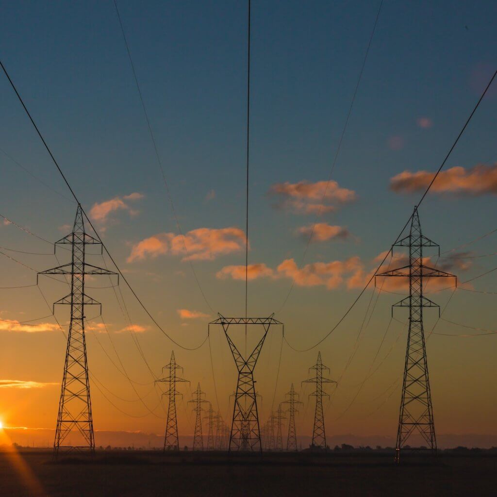 High-voltage truss towers and power factor correction